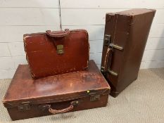 Three pieces of vintage luggage including leather briefcase