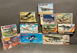 Eleven boxed aircraft model kits