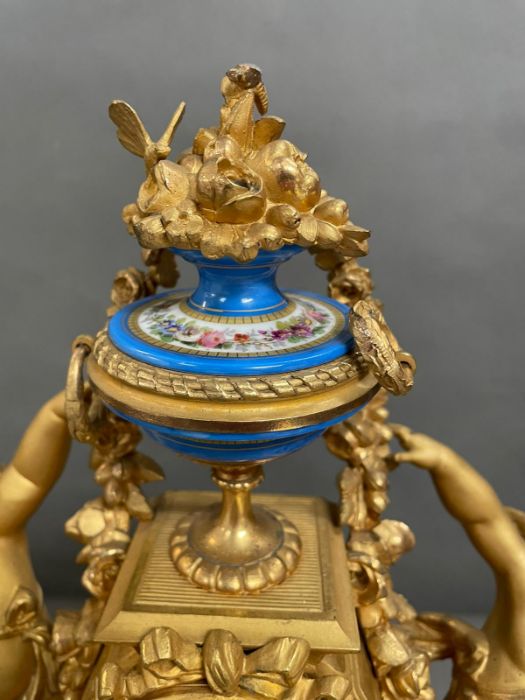 An Eight day Ormolu and enamel eight day clock featuring cherubs and under a glass dome. - Image 6 of 9