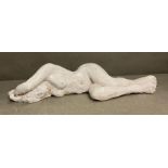 A studio ceramic of a recumbent nude (W52cm)