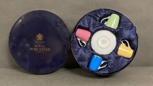 A Royal Worcester four cup coffees set in celebration of HRH 80th Birthday 2006, original box.