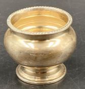 A silver sugar bowl by Walker and Hall, hallmarked for London 1928 (Approximate Total weight 106g)