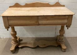 A two drawer pine converted wash stand (H74cm W104cm 49cm)