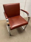 A chrome and leather side chair by Ludwig Miles Van Der Rohe (H79cm W58cm D57cm)