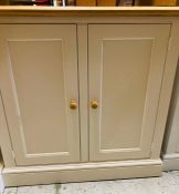 A two door cupboard, pine top and sprayed white doors (H90cm W92cm D50cm)