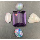 A small selection of loose stones to include Opal.