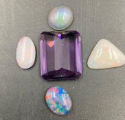 A small selection of loose stones to include Opal.
