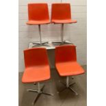 A Formica kitchen table with four Mid Century Steelux London orange chairs (H74cm W92cm D60cm)