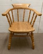 A pine Captains chair with turned legs