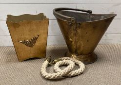 A brass scuttle with a wooden gold painted bin and a rope with brass ends