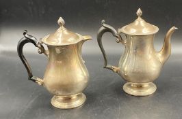 A silver lidded water jug (Total weight Approximate 297g) and a Silver teapot (Total Approximate