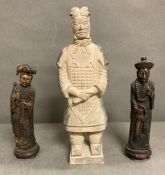 A trio of antique oriental figures