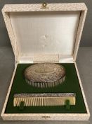 A silver backed brush and comb set, engraved christening set.