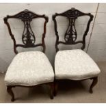 A pair of bedroom chairs