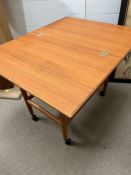 A fold out Mid Century trolly opening to a table