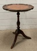 A mahogany side table on tripod legs with leather top (H50cm)