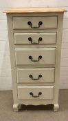 A tall five drawer chest of drawers (H110cm W58cm D45cm)