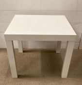 A contemporary white side table (H46cm Sq57cm)