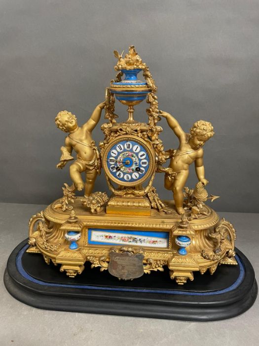An Eight day Ormolu and enamel eight day clock featuring cherubs and under a glass dome. - Image 2 of 9