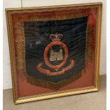 A framed military insignia "Royal Suffolk Hussars"