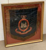 A framed military insignia "Royal Suffolk Hussars"