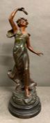 A bronzed figure of a lady playing the tambourine titled Gaite in the manner of Charles Ruchot