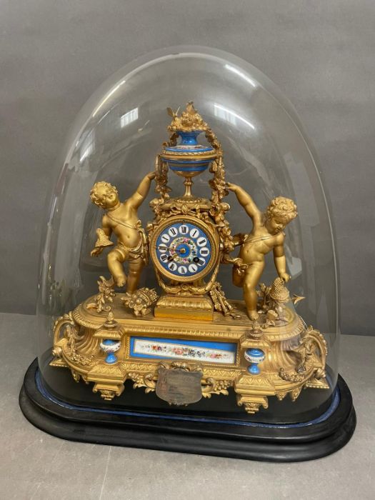 An Eight day Ormolu and enamel eight day clock featuring cherubs and under a glass dome. - Image 9 of 9