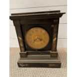 A slate and marble mantle clock
