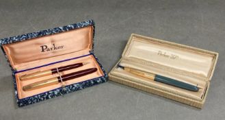 A Parker 51 pen in original box and a Parker 51 pen and pencil set in original box