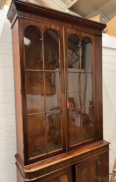 A mahogany glazed bookcase with cupboard under (Base H95cm W110cm D38cm Top H145cm W104cm D33cm) - Image 3 of 5