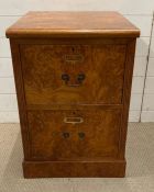 A walnut two drawer filing cabinet