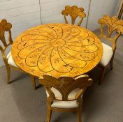 An Art Deco inlaid circular table with scrolled back chairs ( Dia 110cm)