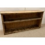 An antique pine shelving unit (H65cm W138cm)