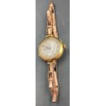 A 9ct gold Ladies watch and expandable strap (12.3g)