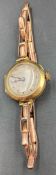 A 9ct gold Ladies watch and expandable strap (12.3g)