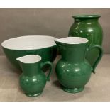 A selection of ceramics to include two jugs, bowl and a vase all in green