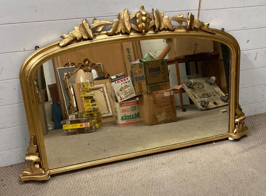 An over the mantel gilt framed mirror 126cm x 60cm