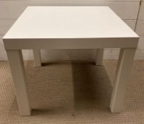 A contemporary white side table (H46cm Sq57cm)