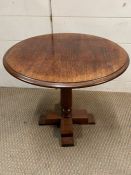 A mahogany pedestal table on square legs (H44cm Dia44cm)