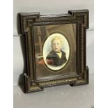 A portrait of a young boy in a sailor uniform, in an ebony style and gilt frame 38cm x 43cm