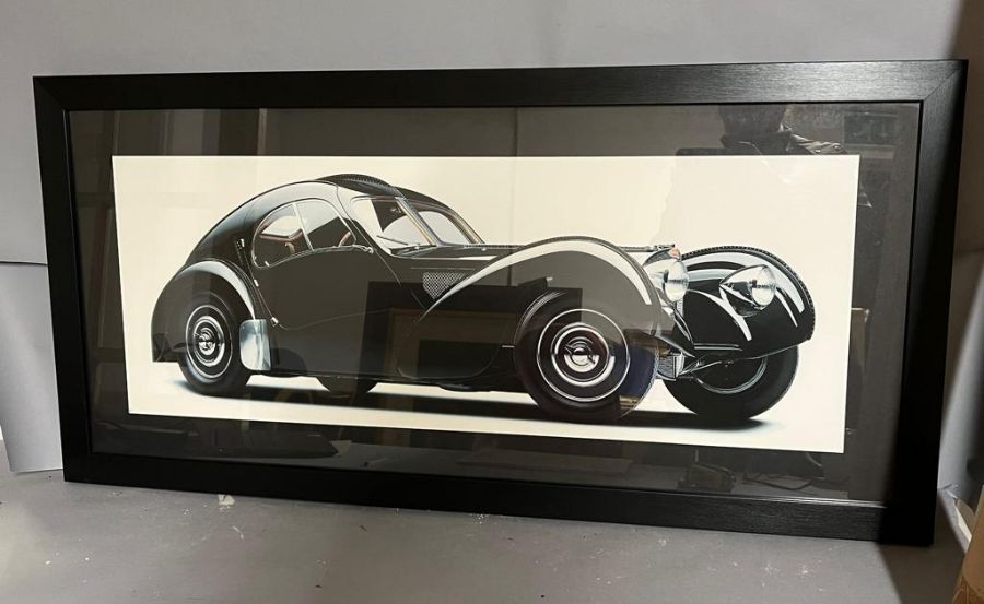 A contemporary print of a classic Bugatti, black and white, framed (54cm x 111cm)