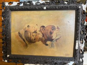 A print of to Bulldogs in carved frame, signed