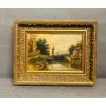 A framed oil on canvas of a river scene (36.5cm x 29cm)
