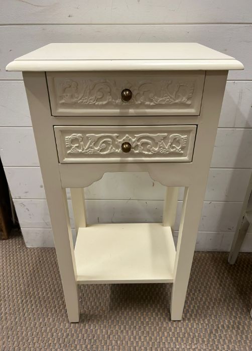 A white bedside with two carved drawers (H70cm W37cm D26cm)