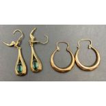 A Pair of 9ct gold earrings (1.5g) and a pair of earrings with green stones marked 585 (3.3g)
