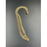 A 9ct gold necklace (Approximate weight 21g)