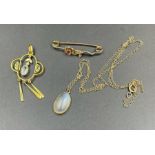 A 9ct gold floral brooch, a pendant, moonstone pendant and chain