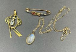 A 9ct gold floral brooch, a pendant, moonstone pendant and chain