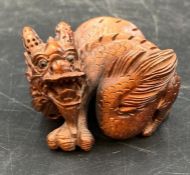 A Netsuke in the form of a Dragon