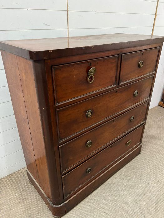 A mahogany two over three chest of drawers with brass ring handles (H120cm W114cm D50cm) - Image 2 of 3